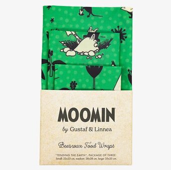 Bild av bivaxdukar med Muminmotiv och gröna detaljer