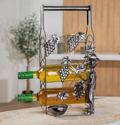 Bild av dekorativ flaskhållare med vinmakarfigur