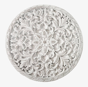 Bild av dekorativ väggprydnad med intrikata mönster