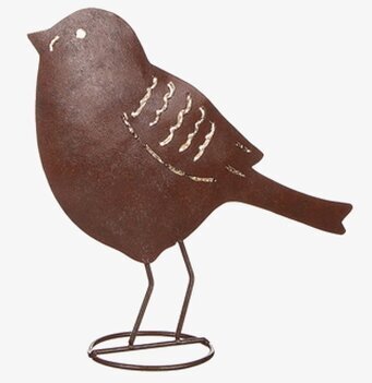 Bild av dekorativ fågel i hamrad plåt med vintage-känsla