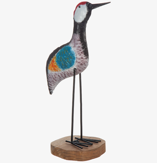 Bild av unik dekorationsfågel i hamrad plåt och träbas