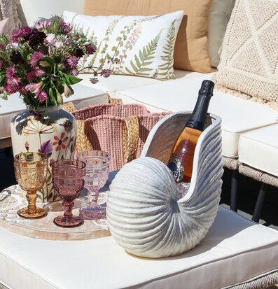 Bild av stilfull och bekväm uteplats med eleganta detaljer