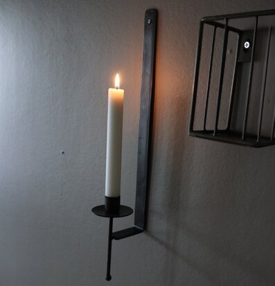 Bild av stilfull väggljusstake i modern inredning