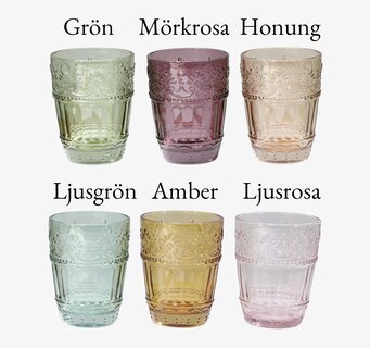 Bild av färgglada tumblerglas med blommiga reliefmönster