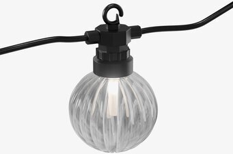 Bild av ljusslinga med spiraldesign och fjärrkontroll