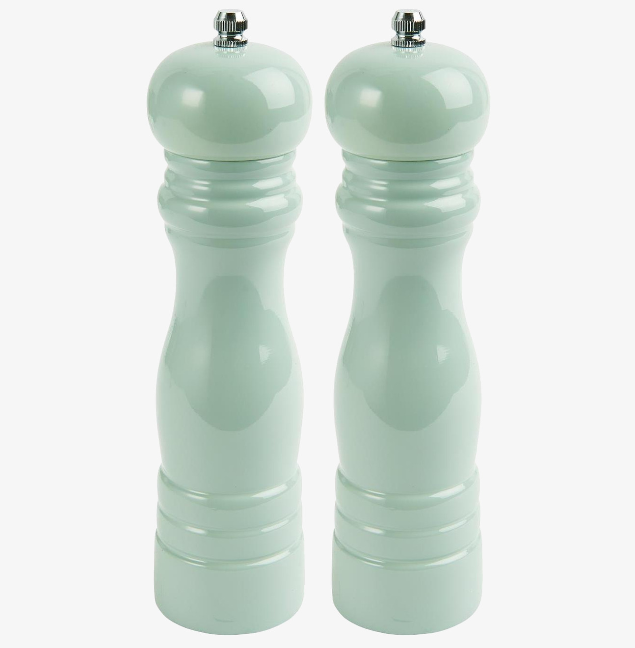 Bild av ljusgröna salt- och pepparkvarnar i elegant design