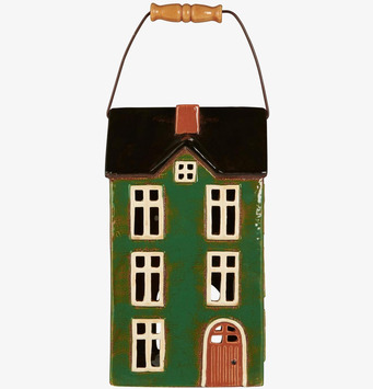 Bild av grön ljuslykta i form av ett pittoreskt hus