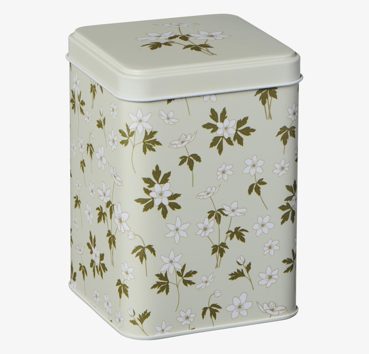 Bild av charmfull plåtburk med blommönster och nostalgi