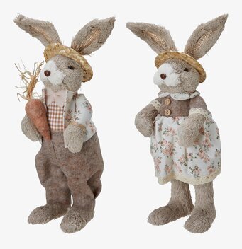 Bild av dekorativa påskharar i vårens färger