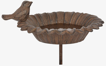 Bild av fågelbad i antikbrun nyans med intrikat design