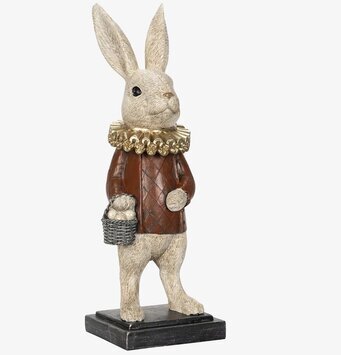 Bild av dekorativ kaninfigur med vårtema och detaljer