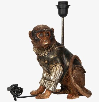 Bild av detaljerad lampfot i form av en elegant apa