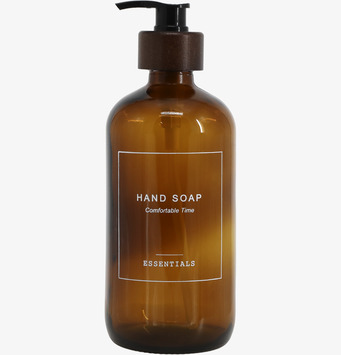 Bild av attraktiv glasflaska med pumpfunktion för tvål