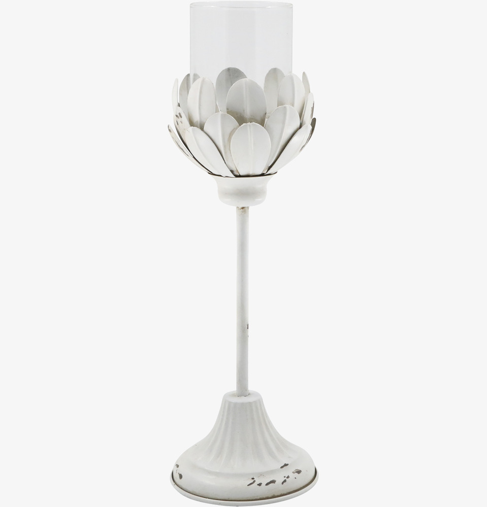 Bild av antik cremefärgad ljusstake med patinerad finish