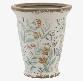 Bild av elegant kruka med blomstermotiv och patina