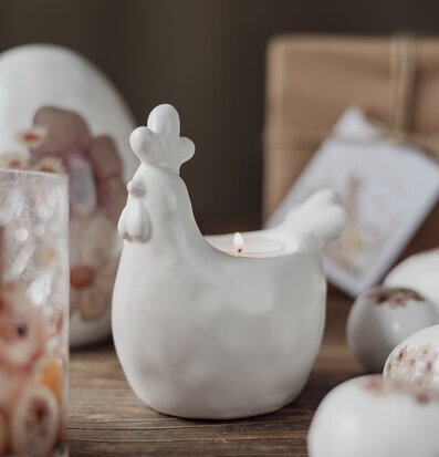 Bild av dekorativ ljuslykta i form av en tupp