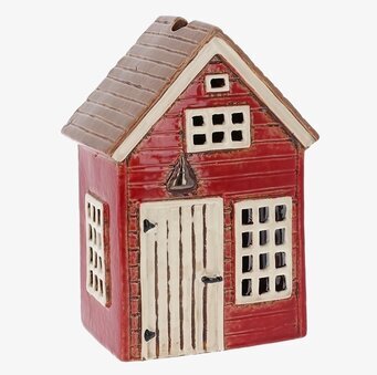 Bild av en charmig ljuslykta formad som ett litet hus