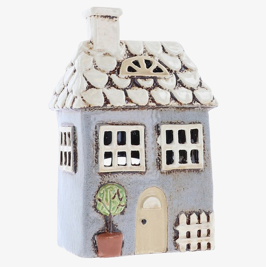 Bild av detaljrik ljuslykta som skapar mysig atmosfär