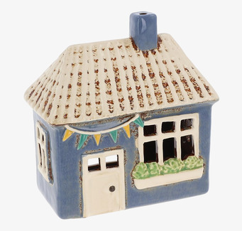 Bild av charmig ljuslykta med unik design och hemtrevnad