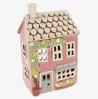 Bild av charmig ljuslykta utformad som blomsterbutik