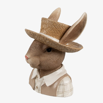Bild av charmig kaninfigur med hatt i stilfull inredning