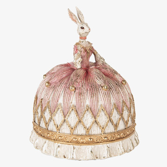 Bild av elegant vit och rosa kaninfigurin i detalj