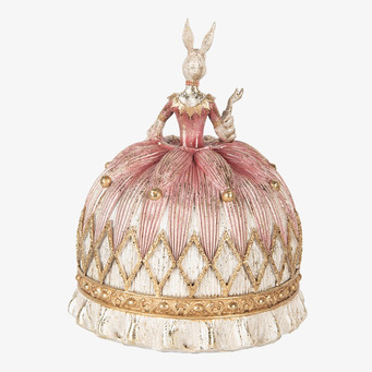 Bild av dekorativ kaninfigur i stilfull klänning