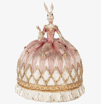 Bild av iögonfallande figurin med kanin i elegant klänning