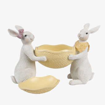 Bild av påskägg med kaniner och gul korgliknande behållare