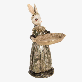 Bild av elegant kaninfigur i beige och guldtoner