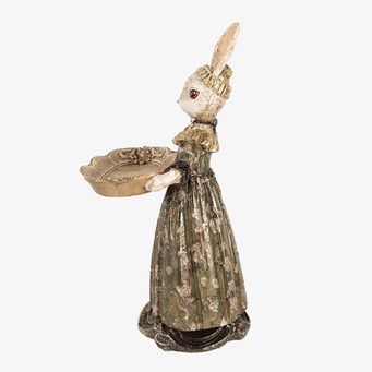 Bild av elegant kaninfigur med dekorativt fat i guld