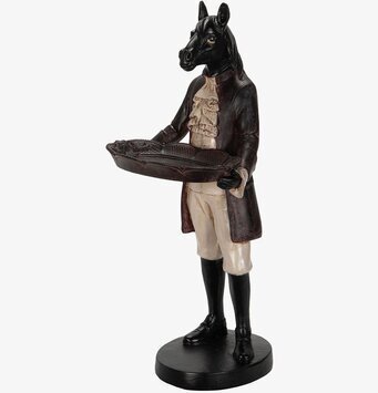 Bild av unik skulptur med hästhuvud och dekorativt fat