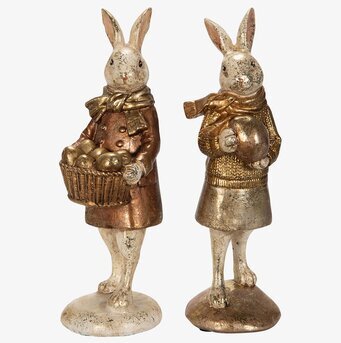 Bild av dekorativa kaninfigurer med ägg och antik finish