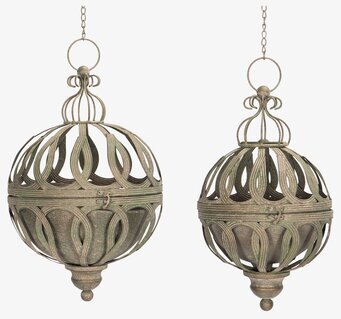 Bild av dekorativa gröna planteringsburar i metall