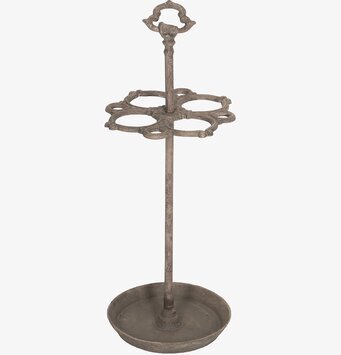 Foto av rustik och funktionell paraplyhållare i metall