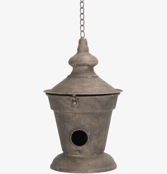 Bild av rustikt fågelbo med antik finish och kedja