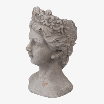 Bild av elegant krukbyst i antik stil med detaljer