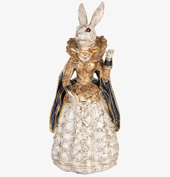 Bild av dekorativ kaninfigur i guld och krämfärger