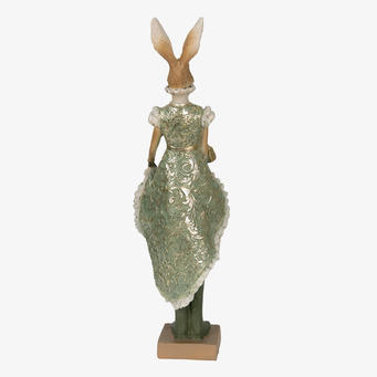 Foto av dekorativ kaninfigur i grön klänning