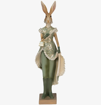 Bild av elegant grön kaninfigur med intrikata detaljer