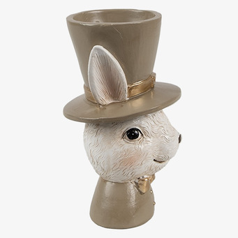Bild av detaljrik äggkopp med kaninmotiv och hög hatt