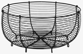 Bild av rund svart trådkorg i metall med öppen design