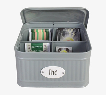 Bild av tidlös grön plåtburk med fack för tepåsar