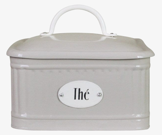 Bild av stilren plåtburk för teförvaring i beige design