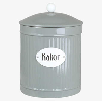 Foto av elegant grön plåtburk med kupolformat lock