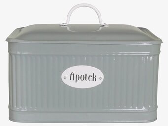 Bild av grön plåtburk med vintagekänsla och stilren design