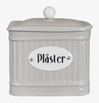 Foto av stilren och praktisk plåtburk för plåster