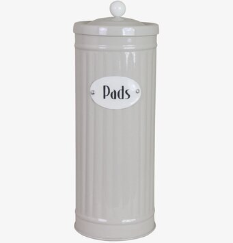 Bild av elegant beige plåtburk för stilfull förvaring