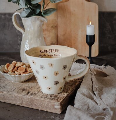 Bild av rustik elegans med harmoniska inredningsdetaljer