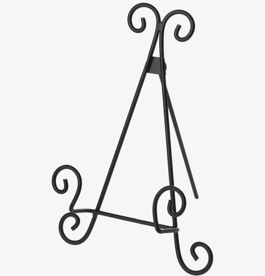 Bild av elegant svart tallriksstativ för heminredning